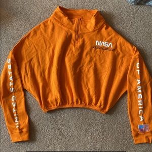 cropped graphic NASA quarter zip